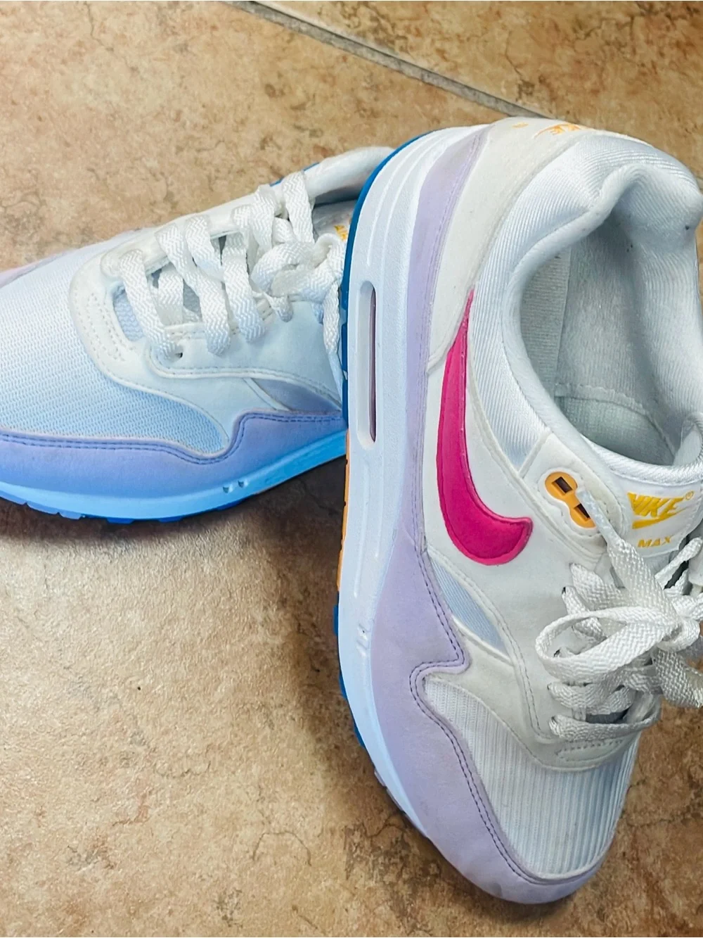 Nike Women’s White Sneakers with Pink, Blue & Lavender Accents